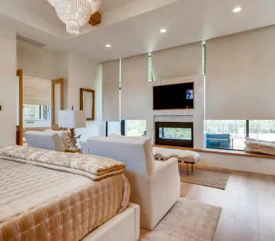 Minimal steel pocket door opening between interior rooms