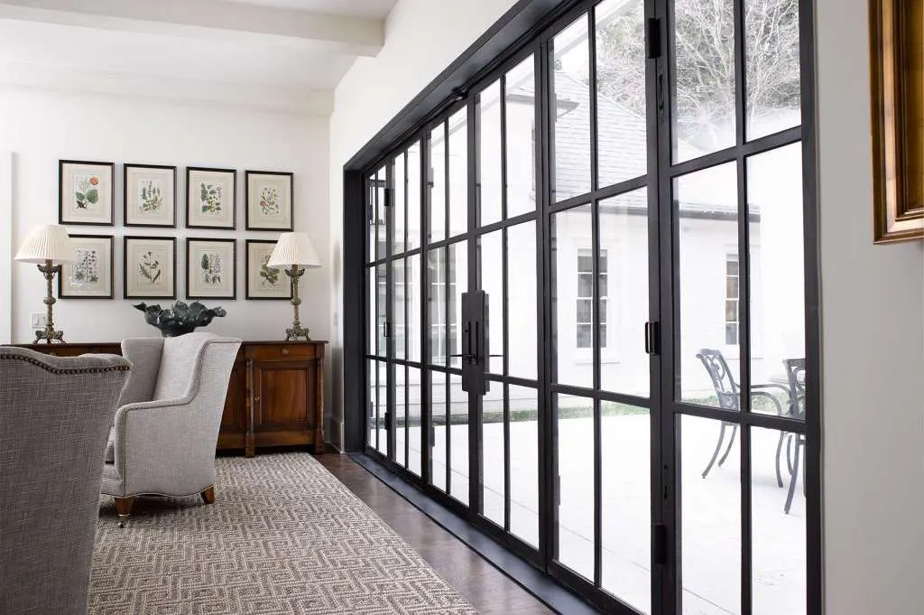 Exterior bifold doors opening to a spacious patio in Austin TX