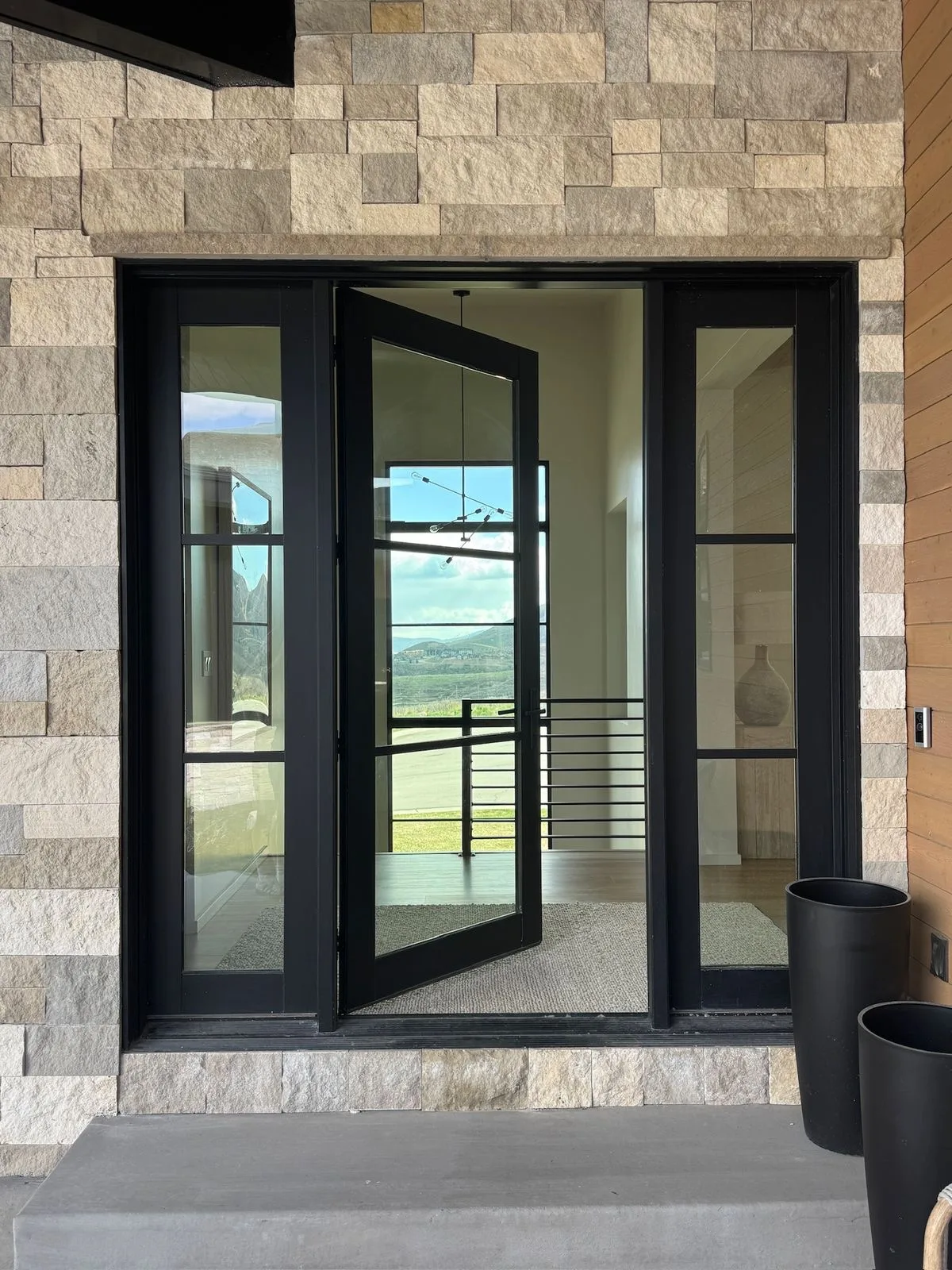 Design inspiration: Open black steel single entry door with full glass panel and matching sidelights Open black steel single entry door with full glass panel and matching sidelights