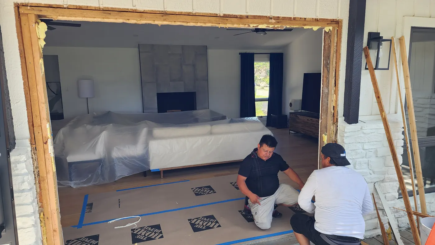 Patio opening stripped and prepared for a new steel door wall in Lakeway, TX