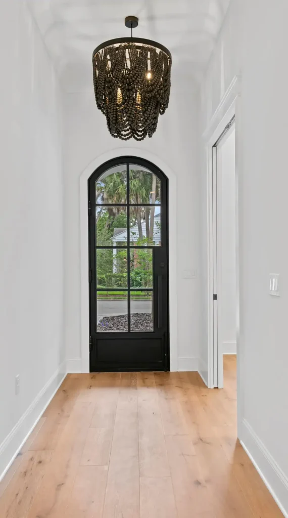 Elegant black steel door in an Austin home