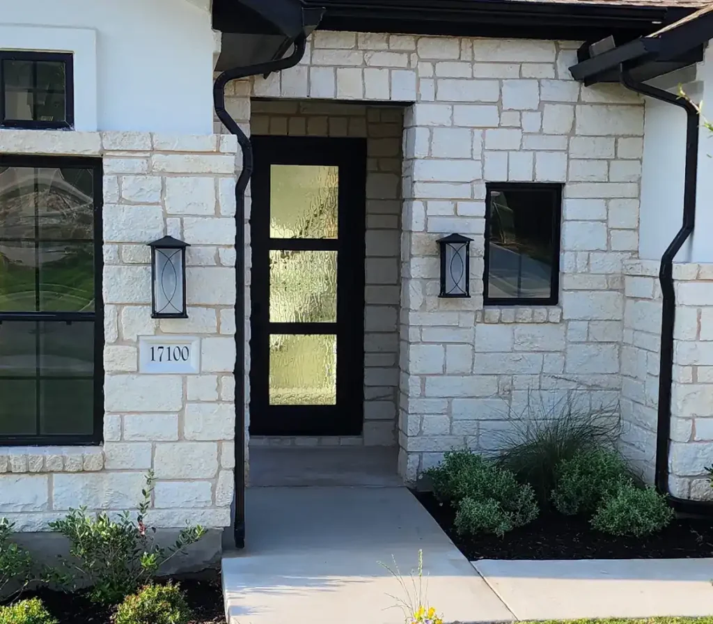 Arched window with a black steel frame