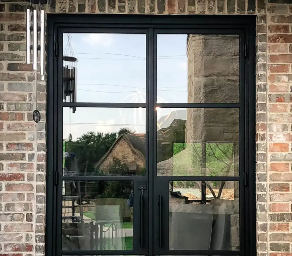 Custom iron double doors installed on a home in Cedar Park Texas